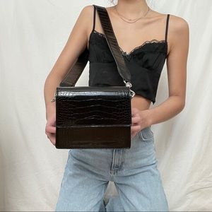 brandy melville shiny black crossbody bag